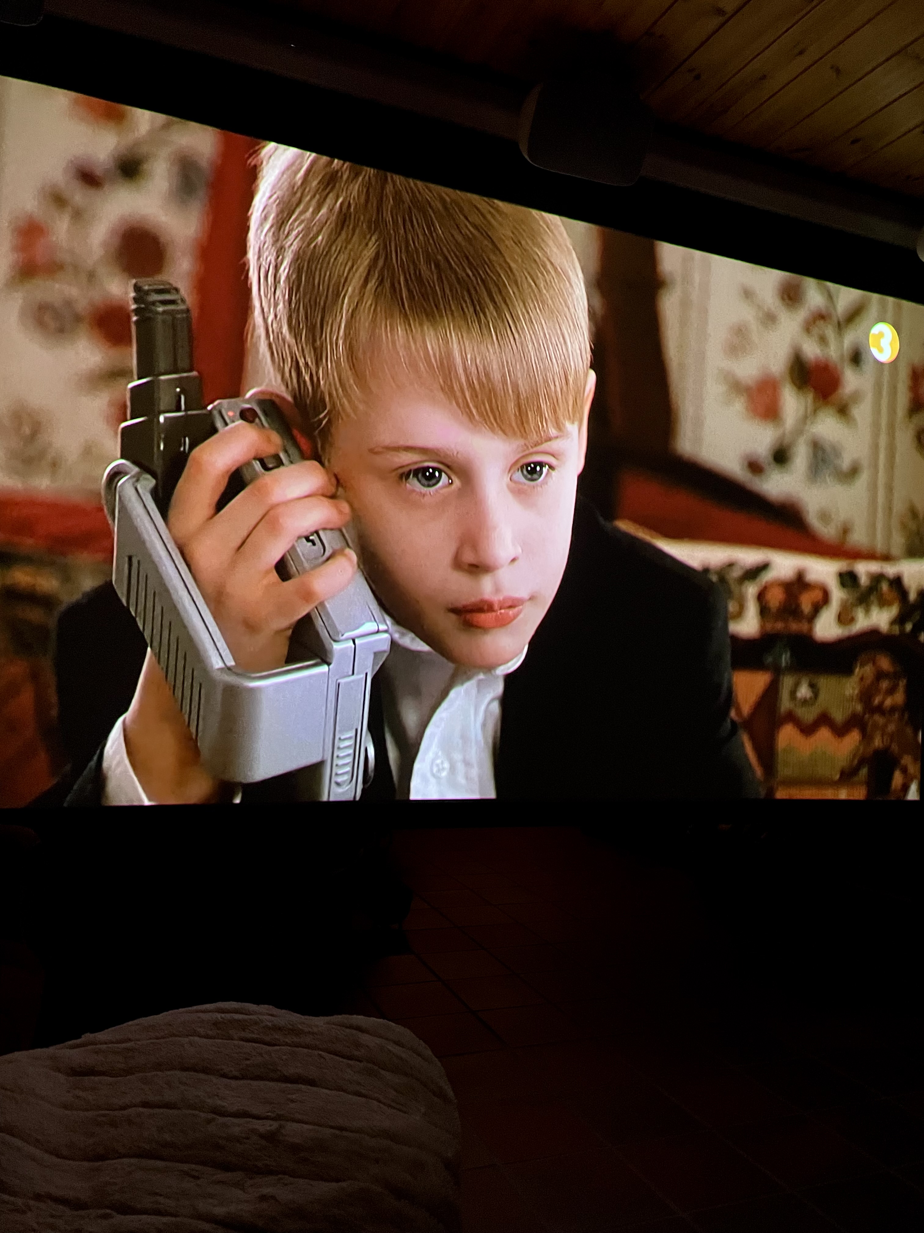 A film playing on a projector screen